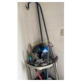 Shepherds hooks, gardening tools, shelving unit