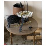 Wooden table, planter, and yard ornaments
