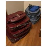 (8) Suit cases