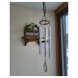 Chimes and wall shelf