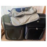 (2) Suit cases and a garment bag