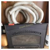 Propane fireplace insert with flexible pipes and