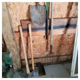 Wedges, axes, pitch fork, shovel and broom