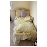 Twin bed with bedding