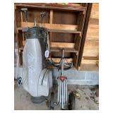 Golf clubs, caddy, and bag