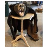 Small table, faux bear skin rug