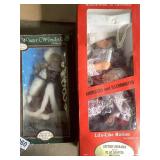 Porcelain doll and animated doll