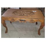 Wood carved coffee table