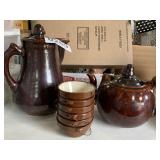 Tea pots and ceramic bowls