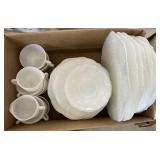 Set of white dinnerware