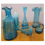Blue glass vases and ashtray