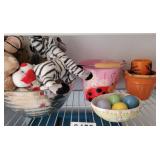 Stuffed animals, glass eggs, bowls and more