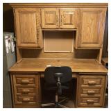 Large wooden desk and chair