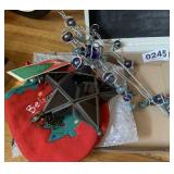 Christmas plates, mittens, hanging decor