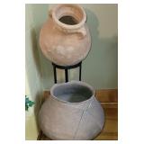 Pottery vases on iron stands