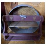Wooden shelf and metal sifter