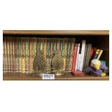 Shelf of books, bookends and more