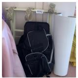 Posters, duffel bag, suite case stand and posters