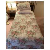 Twin bed w/ bedding