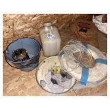 Life preserver, tin bucket, rocks, more