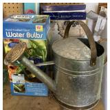 Watering can, water bulbs, light, post mount