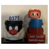 Sylvester Cup and Raggedy Andy pencil sharpener