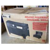 Portable charcoal grill