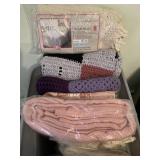 Tote of blankets, afghans and more