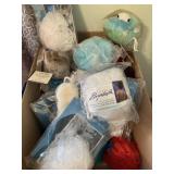 Box of mesh body scrub sponges