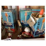 Vintage Christmas candles, porcelain Santa's, and
