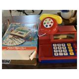 Toy cash register, phone, and play desk