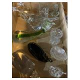 Glass whales, swan, and glassware