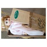 Anne Geddes Santa doll and (2) porcelain dolls