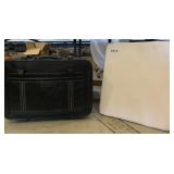 Suitecase and wedge cushion
