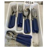 Flatware in container