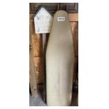 Wooden ironing board and welcome sign