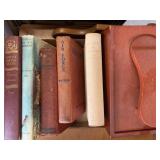 Shoe polish, wooden box and books