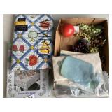 Table cloth, decorative fruit, water bottle