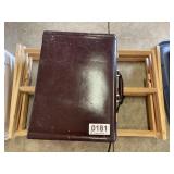 Suitcase and clothes hanging rack