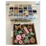Vintage wooden thread spools and thread