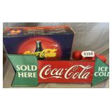 Coca-Cola phones and sign