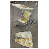 Vintage stroller with rain cover