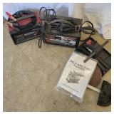(2) battery chargers and sander attachment