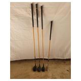 (4) wood shaft golf clubs