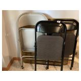 3 folding chairs and card table