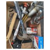 Oil cans, staples, hammer