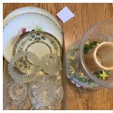 Dishes, candle, glassware.