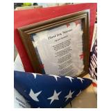 Flag, signs, toy plane