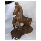 Large carved wooden horse