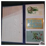 Postcards and album (approx 1/3 full) - mixed